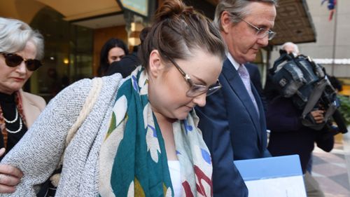  Lauren Cranston, the daughter of Australian Tax Office Deputy Commissioner Michael Cranston leaves the Downing Centre (AAP)