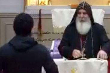 A livestream online shows Bishop Mar Mari Emmanuel giving a service when he is approached by an attacker at Christ The Good Shepherd Church in Wakeley, Sydney.