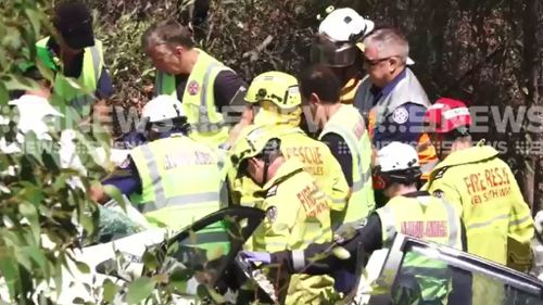 The teenager was trapped for up to 24 hours after his car fell off the side of the road. (9NEWS)
