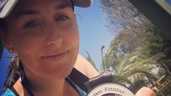 Medal mum: "There were those days when I didn’t want to go." Image: supplied