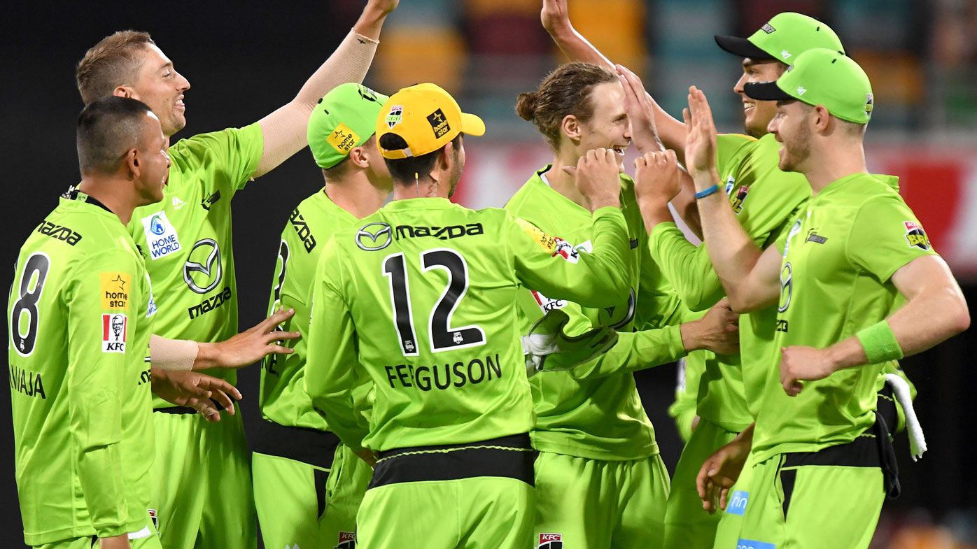 Thunder teammates celebrates after taking a wicket