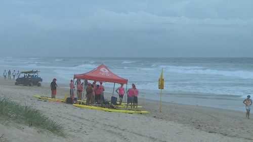 A young surf lifesaving trainee has been rushed to hospital after nearly drowning during a routine exercise on a Gold Coast beach.