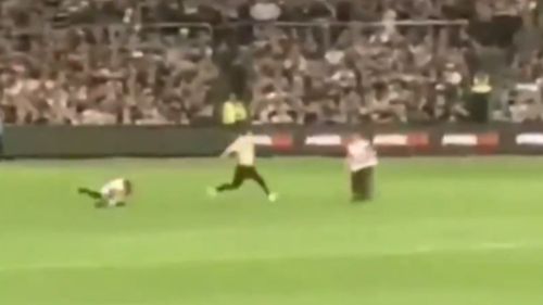 The pitch invader was also caught on camera during last night's match. (9NEWS)