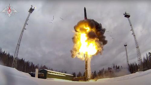 This photo taken from video provided by the Russian Defense Ministry Press Service shows a Yars intercontinental ballistic missile being launched from an air field during military drills. 