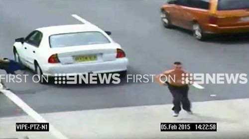 The shirtless men fired at police and drivers during the chase. (9NEWS)