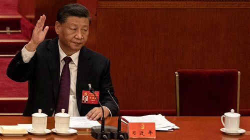 Xi Jinping was emotionless after his predecessor was forcibly removed from the key meeting.