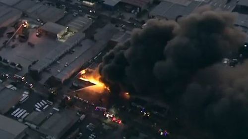 Thick smoke billows from the Campbellfield factory.