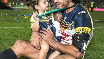 Johnathan Thurston with daughter Frankie after the Cowboys' Grand Final win. (NRL)
