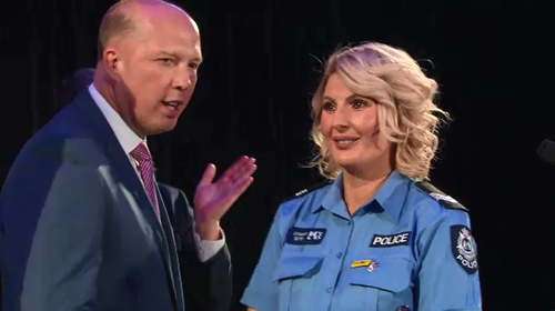 Home Affairs Minister Peter Dutton presented Sen Const Bochorsky with her award.