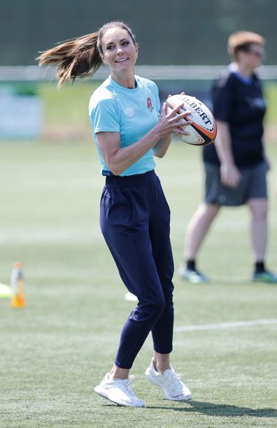 Catherine, Princess of Wales with a ball as she takes part in drills during her visit to Maidenhead Rugby Club on June 07, 2023 in Maidenhead, England. 