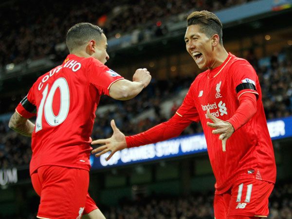 Philippe Coutinho and Roberto Firmino celebrate another goal. (AAP)