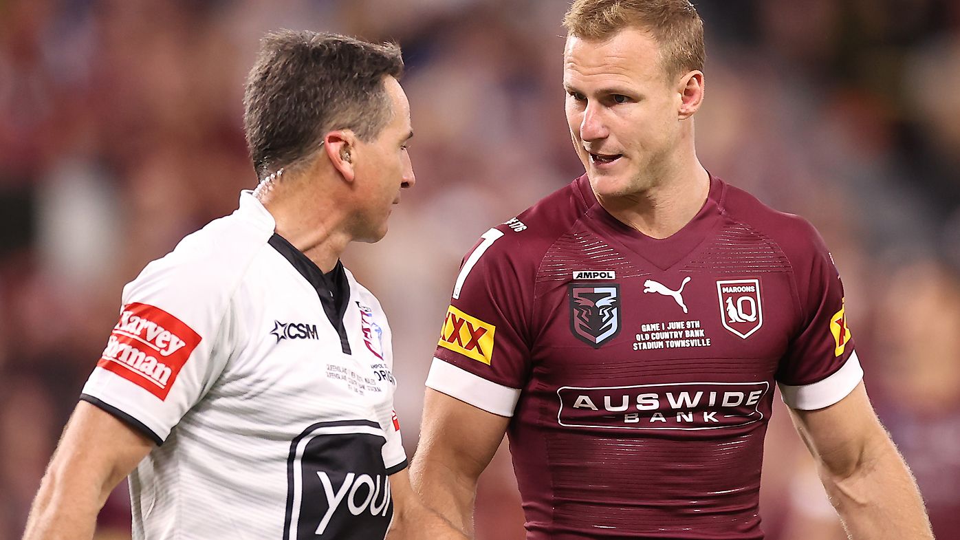 Referee Gerard Sutton speaks to Daly Cherry-Evans of the Maroons