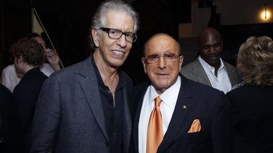 Richard Perry, left, and Clive Davis pose for a photo at the Songs of Hope VIII - City of Hope Music Industry Gala and Fundraiser at the House of Rock, Oct. 18, 2012 in Santa Monica, California