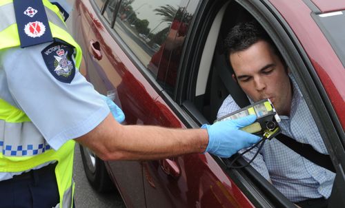 Police perform a random breath test (RBT) on a driver in the Docklands precinct in Melbourne. Picture: AAP