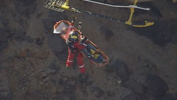 Emergency crews worked to load the boy onto a stretcher at Old Barrington Quarry at 2pm this afternoon.