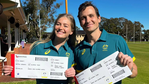 Australian hockey players Alice Arnott and Tom Craig celebrate their selection for Paris 2024 in a social media post.