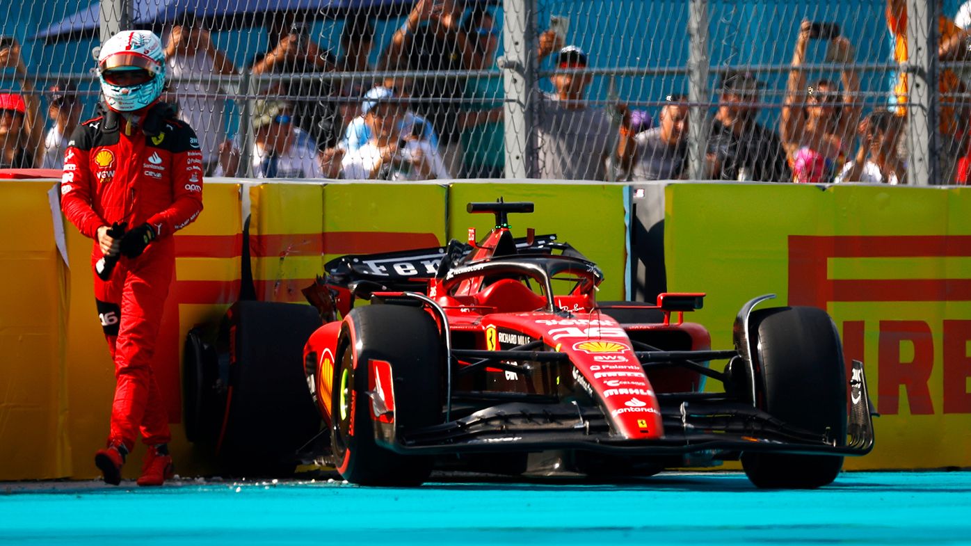 Charles Leclerc walks away from his crashed Ferrari in Miami.