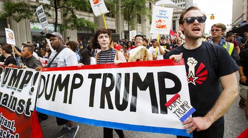 Protesters in the street call for Trump to be dumped in a last-ditch effort to avoid his nomination. (AAP)