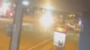 Security vision has captured the moment two utes collided at an Adelaide intersection, flipping one of them on its side, metres away from another crash.