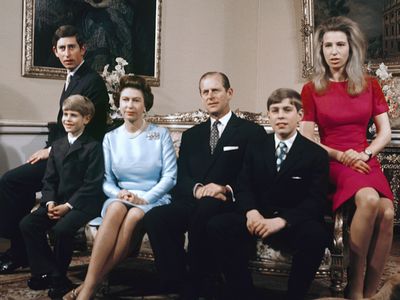 Prince Philip with his children and the Queen