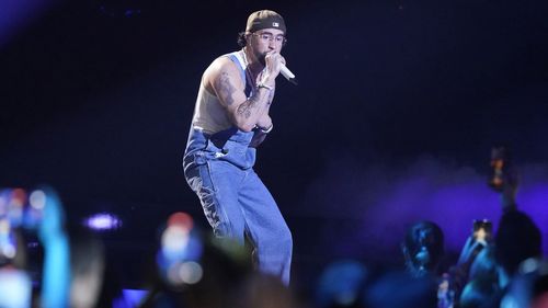 FILE - Bad Bunny performs at the Latin Billboard Awards, Thursday, Oct. 5, 2023, in Coral Gables, Fla. Universal Music Group, which represents artists including Taylor Swift, Drake, Adele, Bad Bunny and Billie Eilish, says that it will no longer allow its music on TikTok now that a licensing deal between the two parties has expired.    (AP Photo/Marta Lavandier)