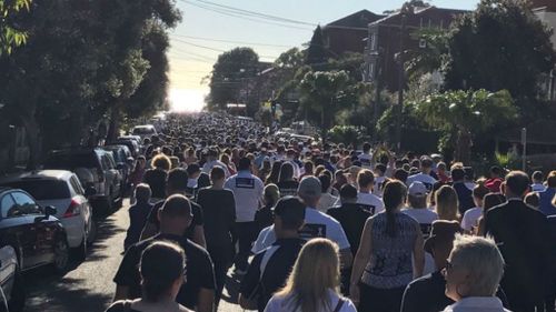 White Ribbon Day: Sea of white as marchers pledge to end domestic violence