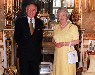 Queen Elizabeth with then-Australian Prime Minister John Howard at Windsor Castle in 1997.