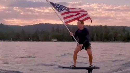 'Take Me Home': Mark Zuckerberg floats above a lake in a memorable July 4 Independence Day video. 