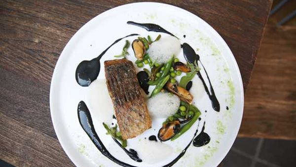 Matthew Butcher's pan roasted barramundi, with mussels and black basil emulsion