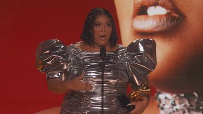 Lizzo accepts Record of the Year at 2023 Grammys.