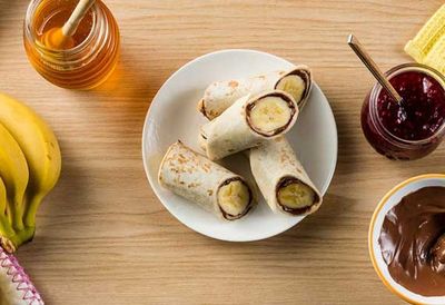 Recipe: <a href="http://kitchen.nine.com.au/2016/05/20/11/10/chocolate-and-banana-roll-up" target="_top">Chocolate and banana roll up</a>
