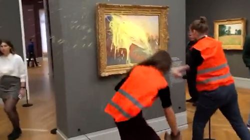 Climate activists throw mashed potatoes at a Monet painting in a German gallery.