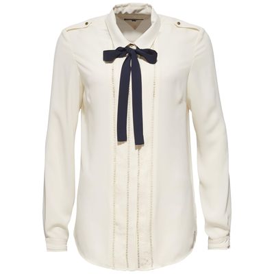 <p><a href="https://global.tommy.com/au/en/collections/holiday/20" target="_blank">Tommy Hilfiger Rosetta Blouse, $299.</a></p>
<p>Co-worker wearing all-white too? Swap to a blouse with details such as this demure yet also right on trend style.</p>