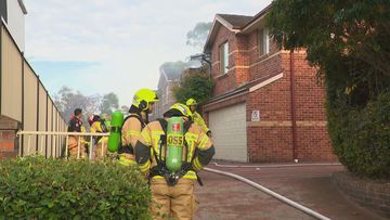Firefighters have battled a blaze that tore through a Sydney home in Auburn.