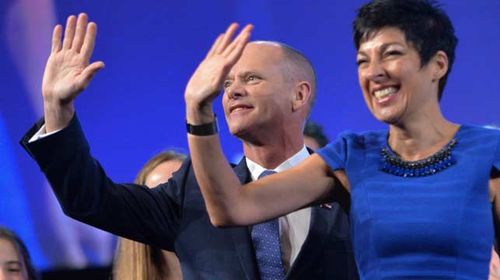Queensland Premier Campbell Newman with his wife Lisa wave to the crowd after arriving for the official launch of the Liberal National Party (LNP) election campaign. (AAP)