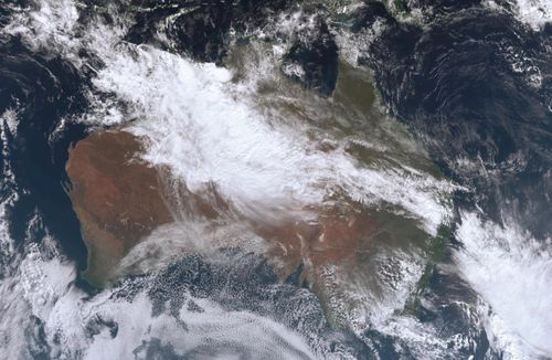A 3000km rainband stretching over a large part of the nation could bring flooding to outback areas.