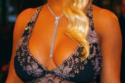 Brynne first came to our attention when she arrived with then-boyfriend Geoffrey Edelsten at the 2009 Brownlows wearing a revealing frock complete with sparkly bra.  Brynne’s been the talk of red (and blue) carpets since – including this outfit.