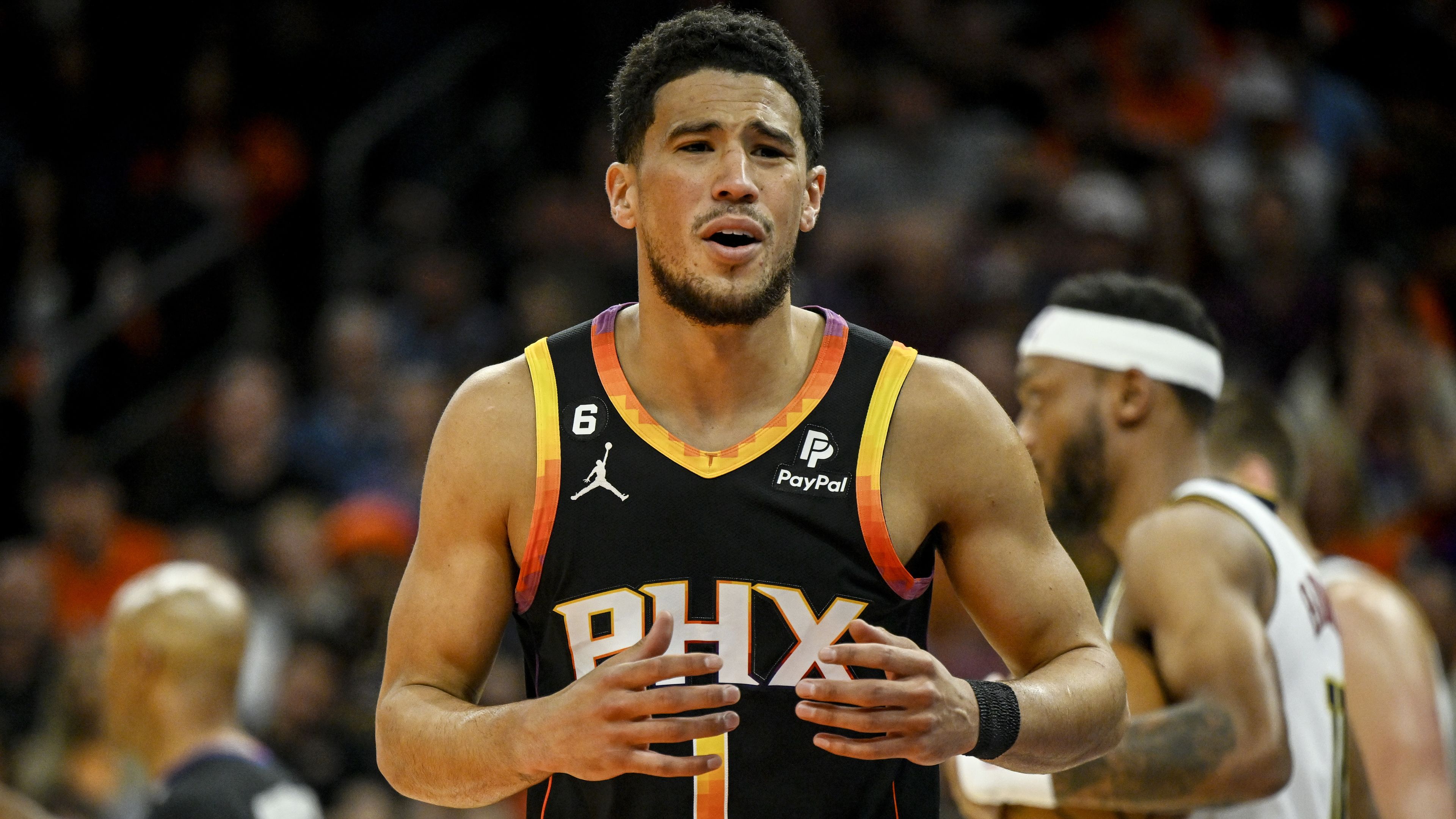 PHOENIX, AZ - MAY 11: Devin Booker (1) of the Phoenix Suns reacts to a call during the first quarter against the Denver Nuggets at Footprint Center in Phoenix on Thursday, May 11, 2023. (Photo by AAron Ontiveroz/The Denver Post)