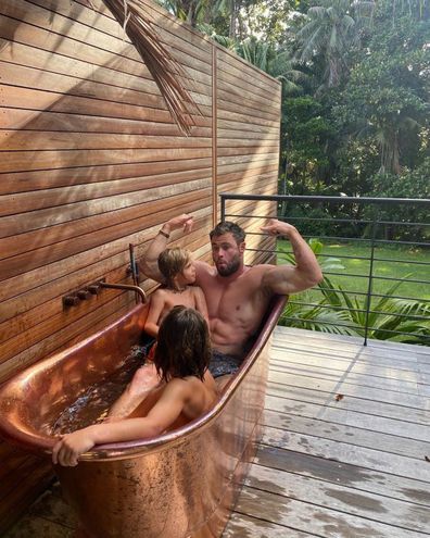 Chris Hemsworth showed off his chiselled abs in the bath with two of his kids