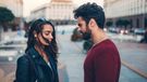 Couple arguing in the street