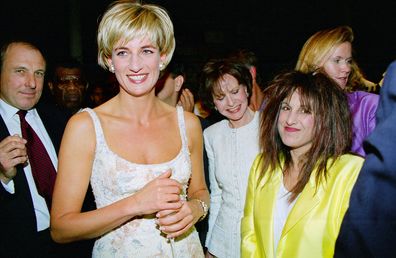UNITED STATES - JUNE 23:  Diana, Princess of Wales with designer Elizabeth Emanuel at the pre-auction party at Christie's, New York, Her dress is by designer Catherine Walker, Diana's bodyguard, Dave Sharp, is on the left  (Photo by Tim Graham Photo Library via Getty Images) June 1997