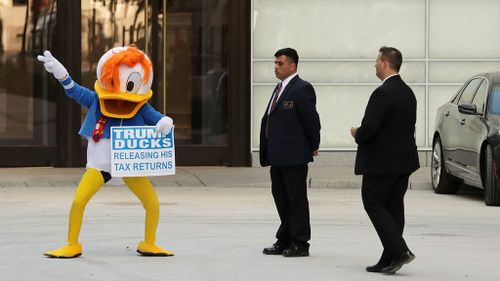 Donald Trump has accused Hillary Clinton of breaking the law with Donald Duck stunt.