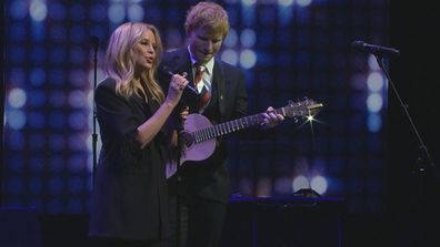 Kylie Minogue and Ed Sheeran on stage at Michael Gudinski memorial at Rod Laver Arena