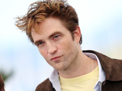 Robert Pattinson poses during the Die My Love photocall at the 78th annual Cannes Film Festival at Palais des Festivals on May 18, 2025 in Cannes, France.