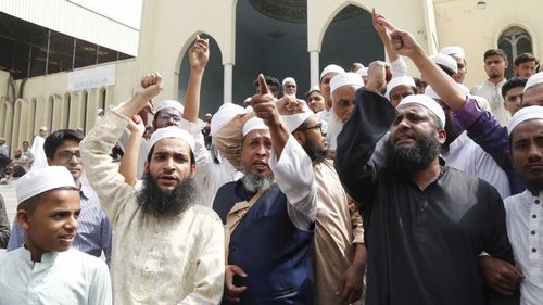 Bangladeshi men demonstrate after the Christchurch mosque massacre on Friday.