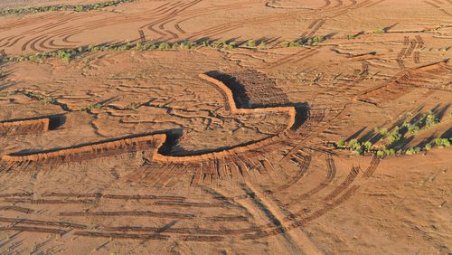 These earthworks outside the drought-hit NSW town of Whitecliffs were meant to prevent flooding.