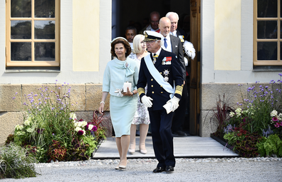 Sweden's Queen Silvia and King Carl Gustaf leave, after the Christening ceremony of Prince Julian, at the Drottningholm Palace Chapel, in Stockholm, Sweden, Saturday, Aug. 14, 2021.