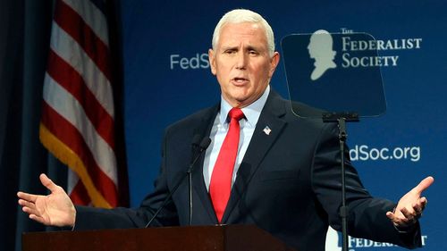 Former Vice President Mike Pence speaks at the Florida chapter of the Federalist Society's annual meeting.