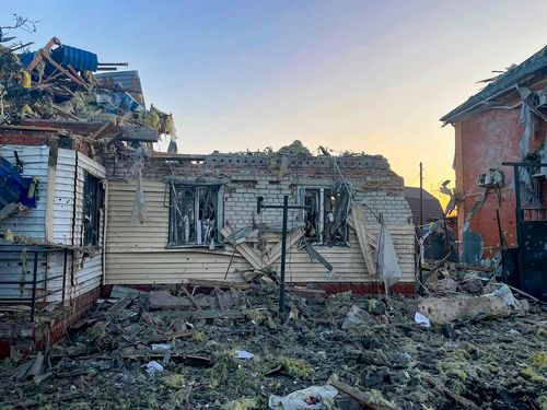 damaged house after shelling by the Ukrainian side in the city of Sudzha, Kursk region that borders Ukraine, Tuesday, Aug. 6, 2024.  