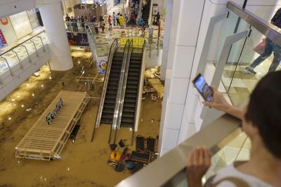Floodwater in a shopping mall during heavy rain in Hong Kong, China, on Sept. 8, 2023. Hong Kongs heaviest rainstorm since records began in 1884 flooded the financial hubs streets and sent torrents of water rushing through subway stations, bringing much of the city to a standstill and forcing the stock market to halt morning trading on Friday. Photographer: Justin Chin/Bloomberg